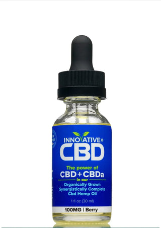 Bottle of Innovative CBD oil with a blue label on a white background