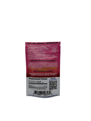Supplement package with pink label on a white background