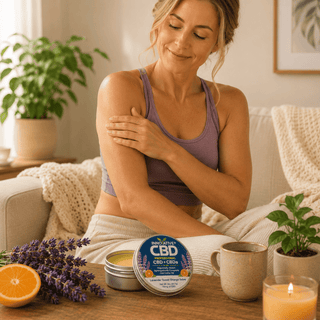 Woman applying Innovative CBD Lavender Sweet Orange Salve in a calming luxury wellness setting featuring full spectrum CBD and CBDa topical balm with botanical spa-inspired atmosphere.