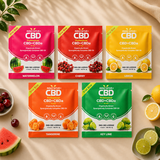 Innovative CBD trial size CBD+CBDa lozenge flavor collection featuring watermelon, cherry, lemon, tangerine, and key lime varieties in a premium wellness flat lay composition.